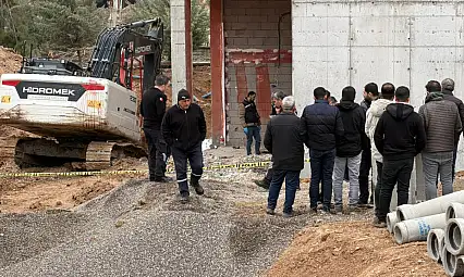 İnşaatta can pazarı: İş makinesi ile duvar arasında sıkışan işçi öldü