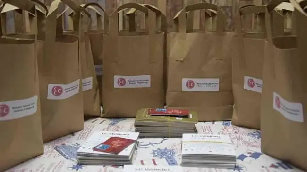 MHP'den ihtiyaç sahiplerine yardım ve bayram şekeri