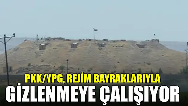 Terör örgütü PKK/YPG, rejim bayraklarıyla gizlenmeye çalışıyor