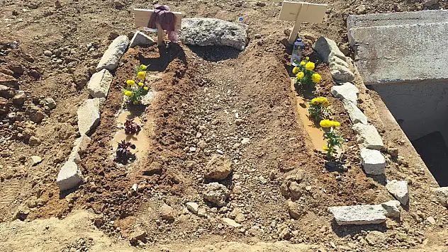 Katili eşiyle yan yana toprağa verildi