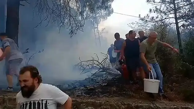 Mahalleli birlik oldu, kovalarla müdahale etti