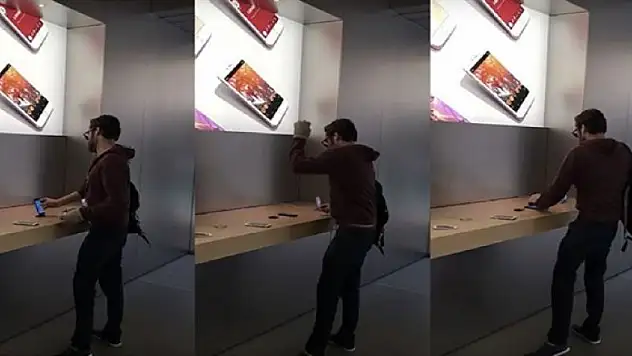 Öfkeli müşteri Apple Store'daki iPhone'ları parçaladı!