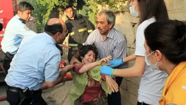 Yanan evine girmeye çalıştı