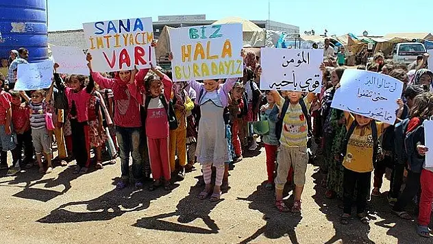 Sınır ötesindeki Suriyeliler destek bekliyor
