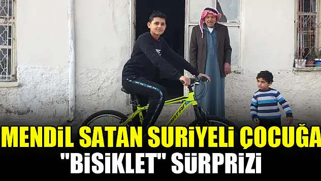 Mendil satan Suriyeli çocuğa 'bisiklet' sürprizi