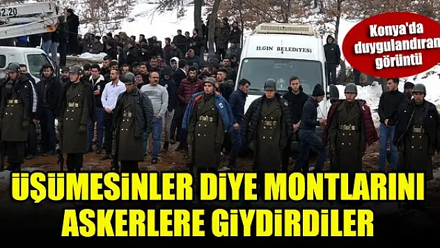 Konya'da duygulandıran görüntü...Üşümesinler diye montlarını askerlere giydirdiler