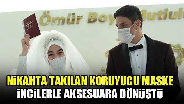 Nikahta takılan koruyucu maske incilerle aksesuara dönüştü