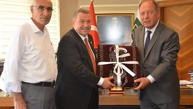 Şehit ailelerinden   Oprukçu'ya ziyaret