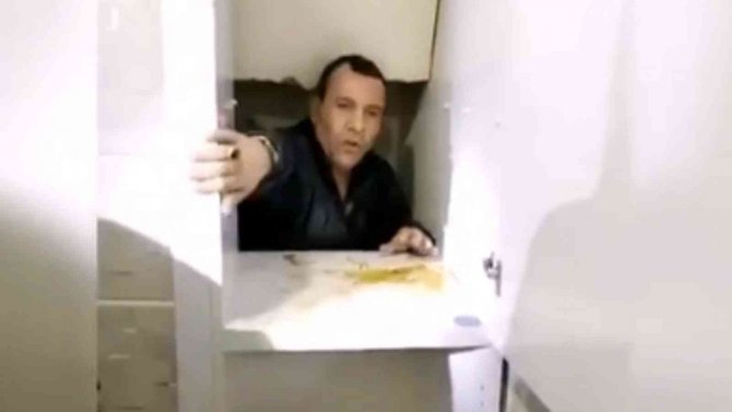 Polisin aradığı zanlı dolabın arkasındaki gizli bölmede yakalandı