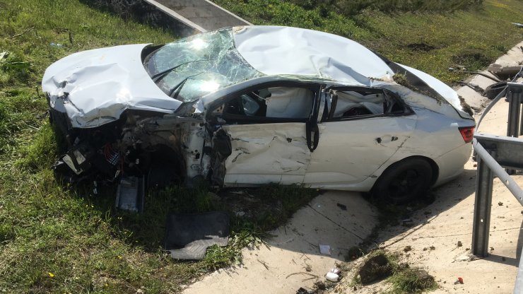 Takla atan otomobilin sürücüsü yara almadan kurtuldu