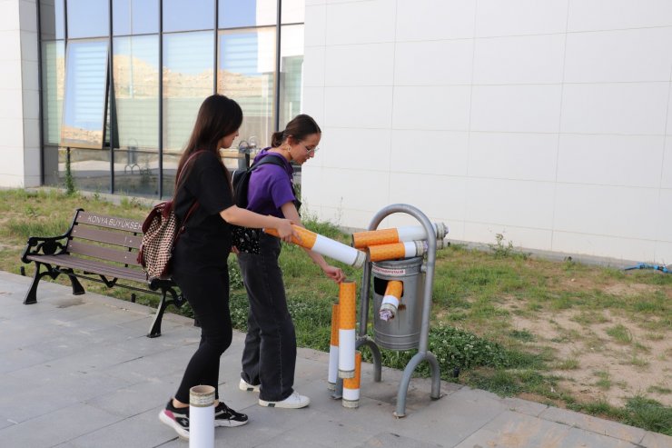 Üniversite kampüsünde maket izmaritlerle farkındalık oluşturdular