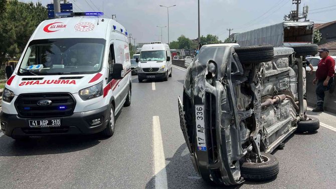 Otomobil takla atıp yan durdu