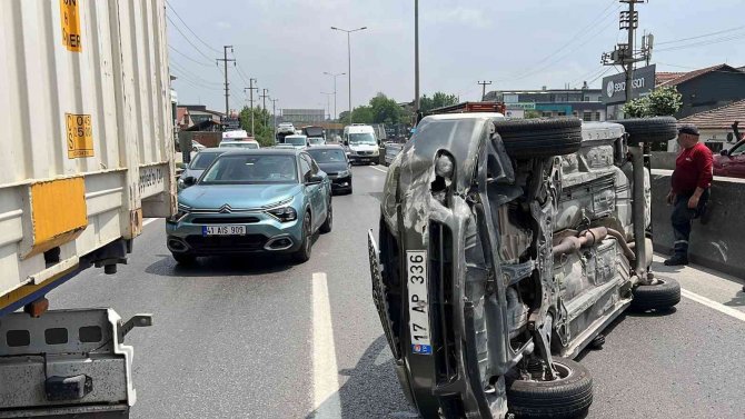 Otomobil takla atıp yan durdu