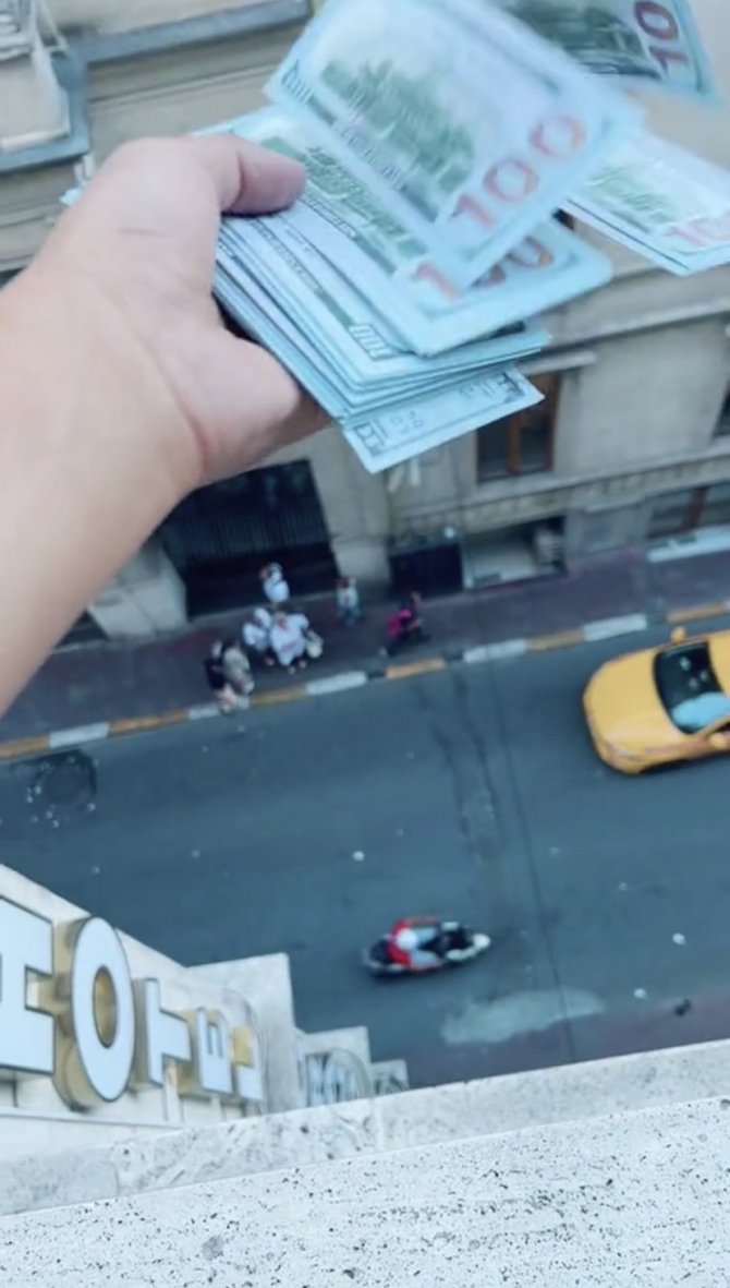 Otel penceresinden dolar saçan şahıs yakalandı