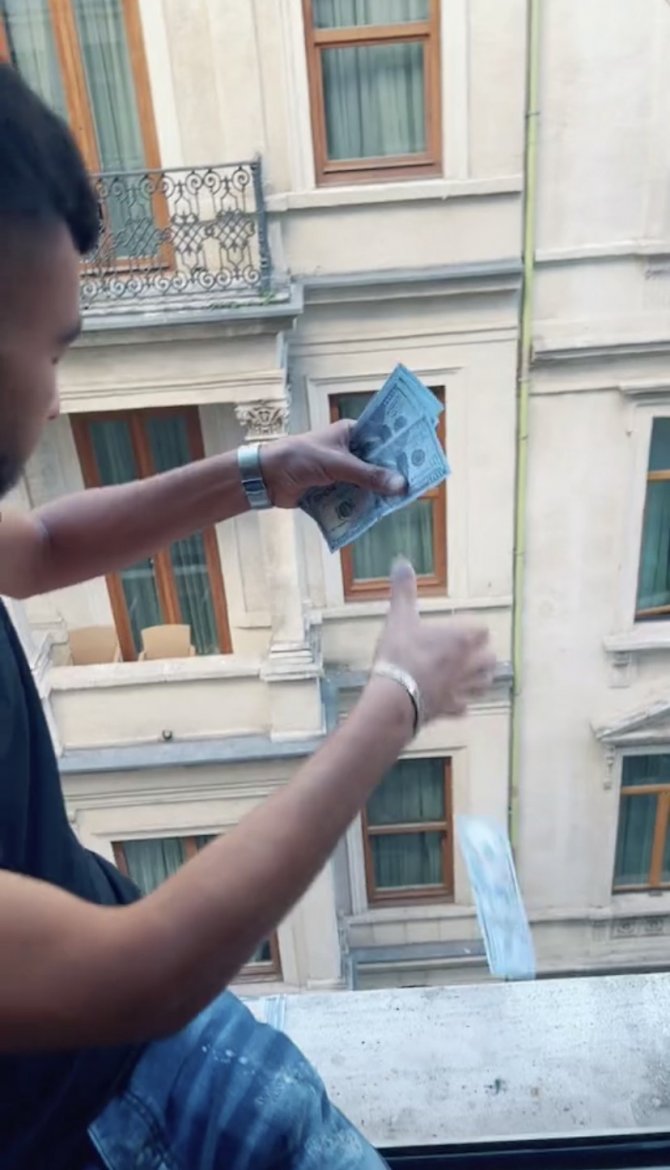 Otel penceresinden dolar saçan şahıs yakalandı