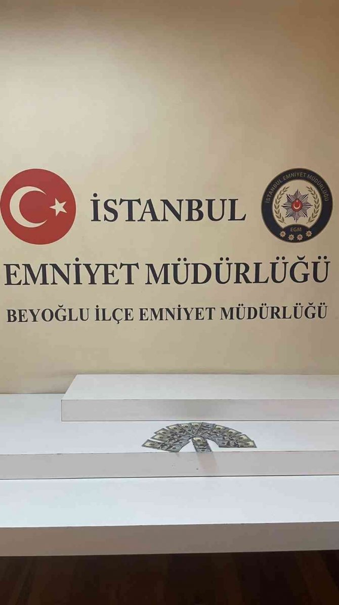 Otel penceresinden dolar saçan şahıs yakalandı