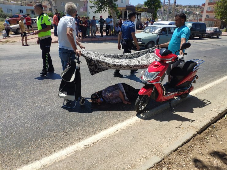 Elektrikli bisikletin çarptığı kadına örtüyle gölge yaptılar