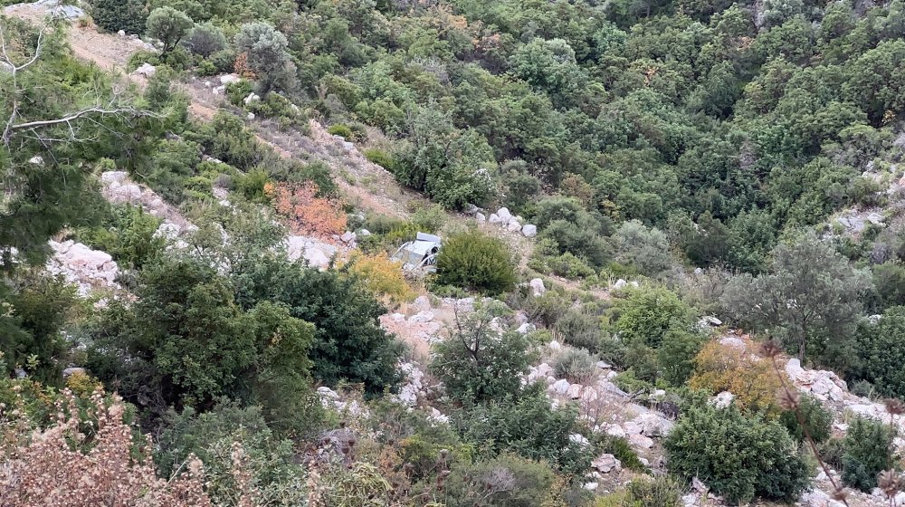 Eşiyle tartışıp, boş otomobili uçuruma itti