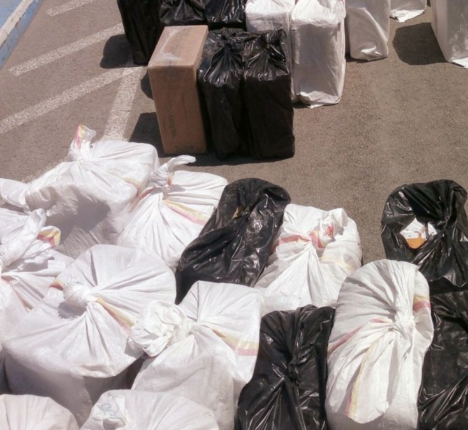kepek-ve-misir-arasi-55-bin-paket-kacak-sigara-2.jpg